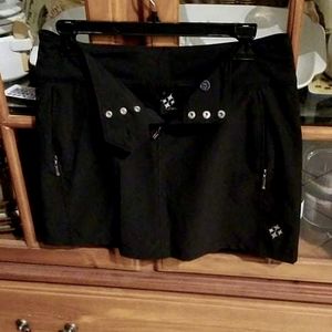 Womens golf skort. JoFit size 2 black like new